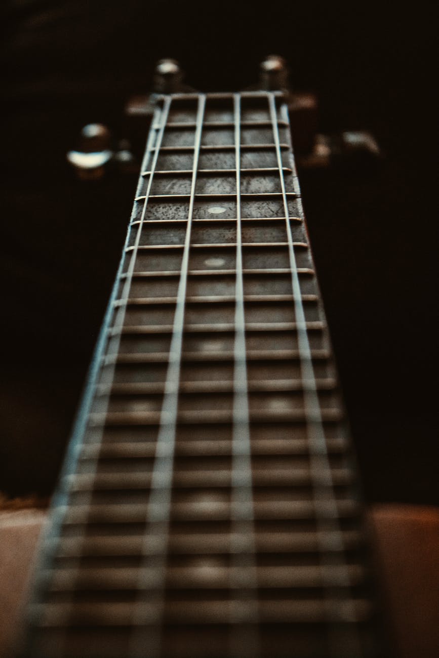 selective focus photo of fretboard